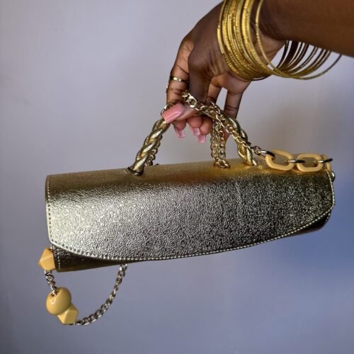 Gold cylindrical bag