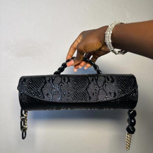 Black cylindrical handmade leather bag – The Braids Brand Ghana