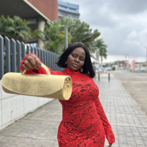 Gold cylindrical handmade leather bag