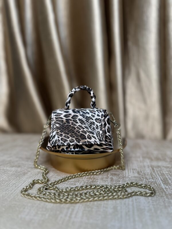 Mini handmade leather handbag in print – The Braids Brand Ghana