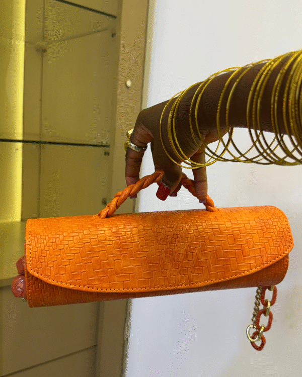 Orange Cylindrical handmade leather bag – The Braids Brand Ghana